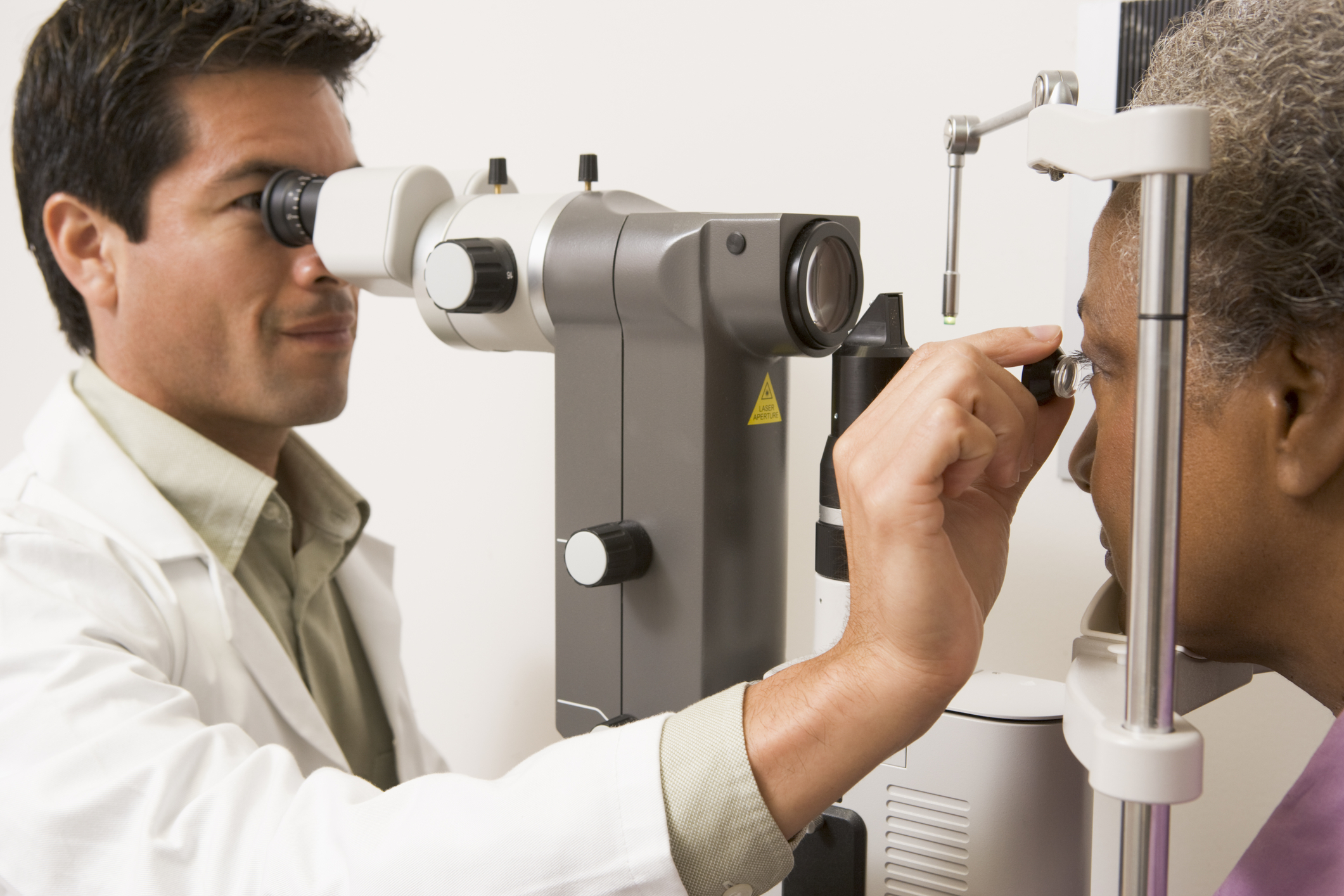 doctor examining patient eye