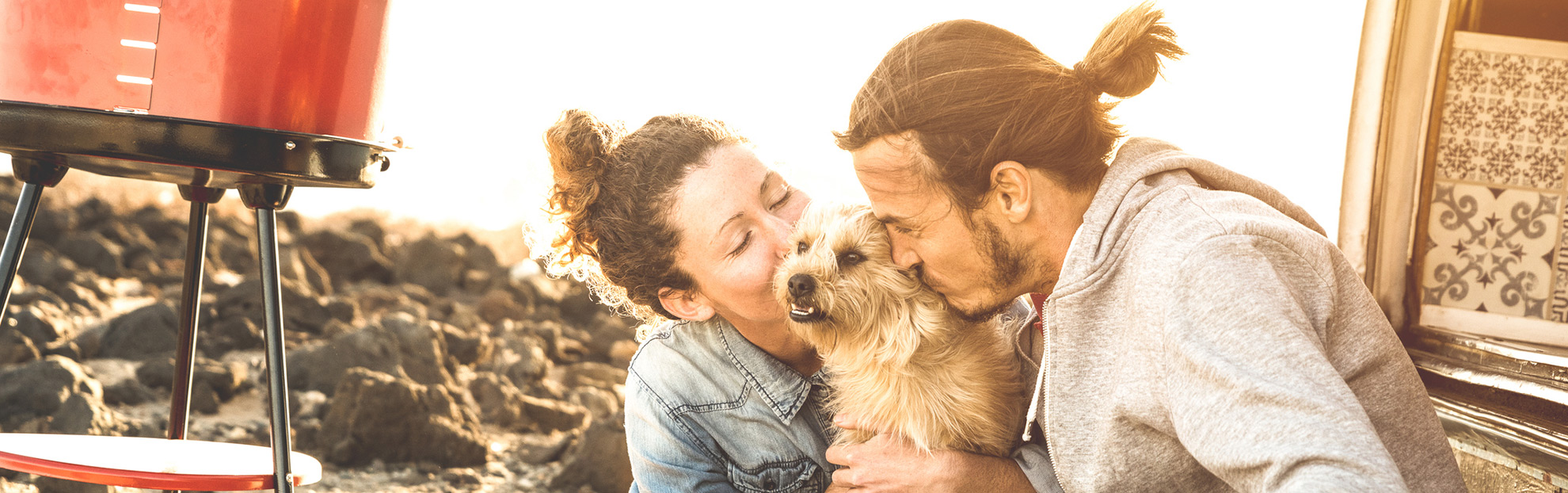 LASIK eye surgery patient happily recovered and spending time with partner and dog