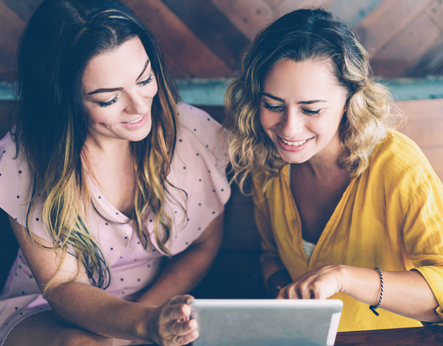 Women researching LASIK Surgery costs and alternatives