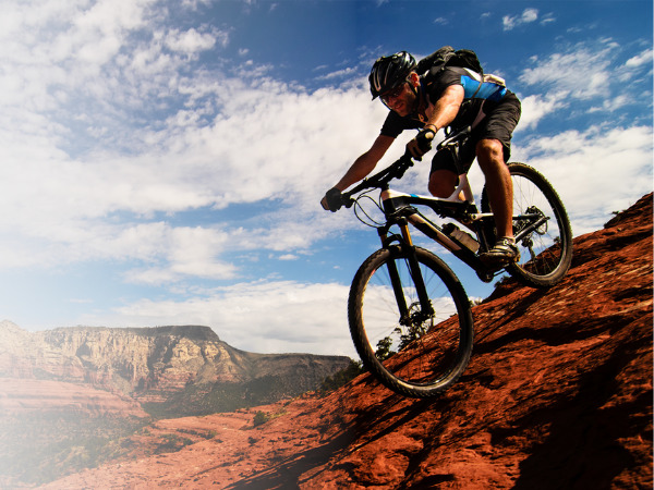 Mountain biker going downhill in Arizona