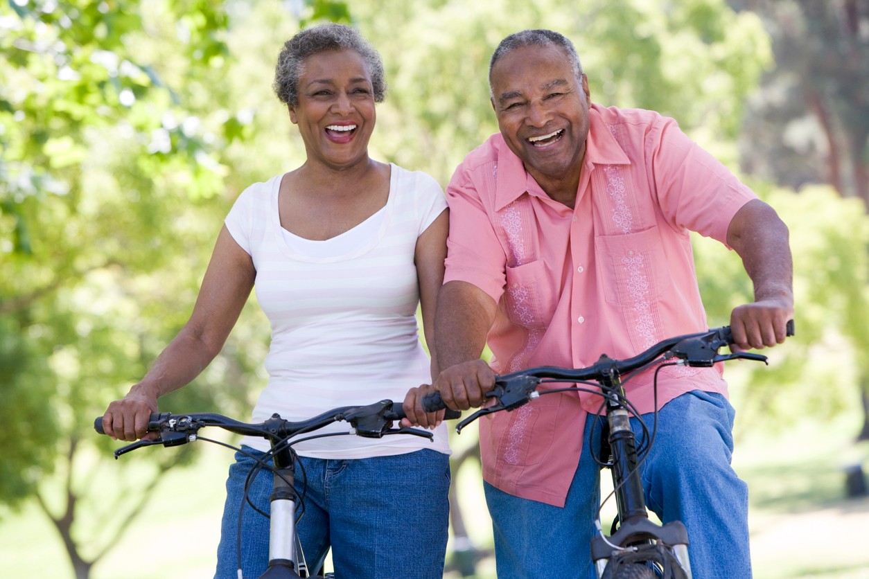 senior-couple-riding-bikes