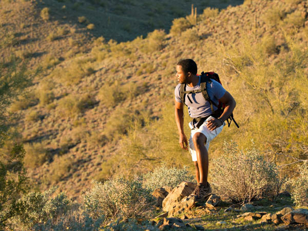 young man enjoying hiking after lasik surgery in Gilbert Arizona