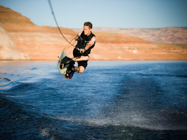 young man wakeboarding after lasik surgery in Phoenix Arizona