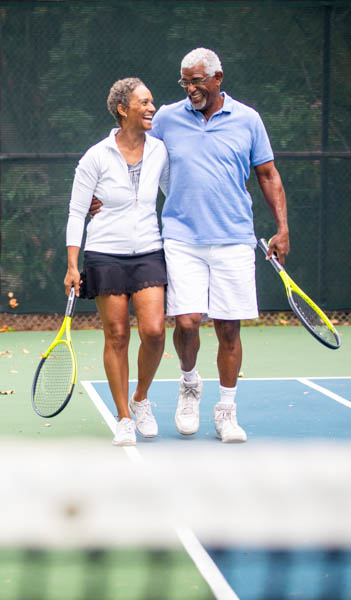 elderly couple enjoying tennis after cataract surgery in Sun Tan Valley Arizona